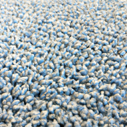A close-up image of a commercial carpet showing the texture and fiber construction